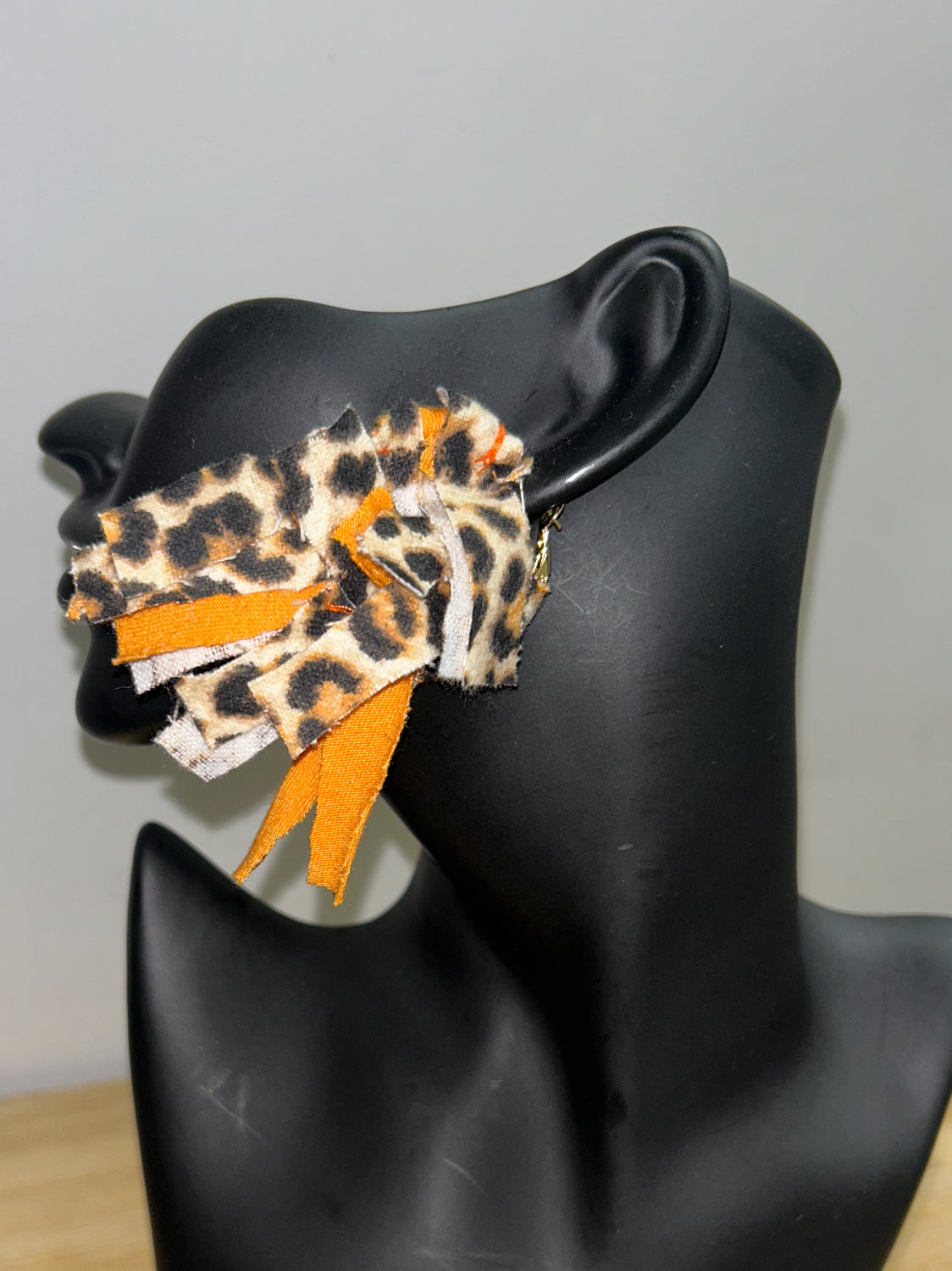 small orange and leopard print earrings-designs by Schequita